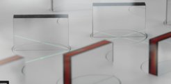 Nahaufnahme eines Laserkickers mit mehreren Reihen an mit Vorder- und Rückseiten reflektierenden Spiegeln in der Größe von Dominosteinen. Die Spiegel werden durch Drehscheiben in der Spielfeldoberfläche jeweils in einer Reihe parallel bewegt. Auf der weißen Spielfeldoberfläche zeichnet sich ein grüner Laserstrahl ab; Die Linien werden in manchen Spiegeln reflektirt.